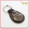 Oval Shape Antique Gold Embossed Metal & Leather Key Fob